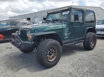  Salvage Jeep Wrangler